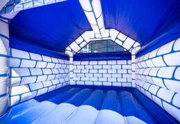 Koop standaard blauw kasteel springkastelen met een ridder thema voor kinderen. Koop springkastelen online bij JB Inflatables Nederland