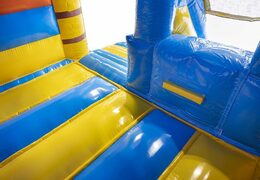 bestel opblaasbaar springkussen met glijbaan in caribbean thema met surfboard erop voor kinderen