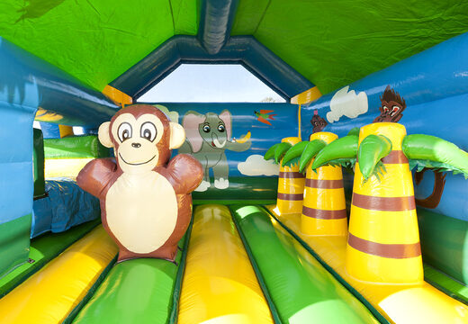 Jungle opblaasbaar overdekt springkasteel met glijbaan kopen bij JB Inflatables Nederland. Bestel online springkastelen bij JB Inflatables Nederland