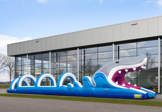 Bestel een perfecte opblaasbare 18meter lange buikschuifbaan in haai thema voor kinderen. Koop opblaasbare buikschuifbanen nu online bij JB Inflatables Nederland