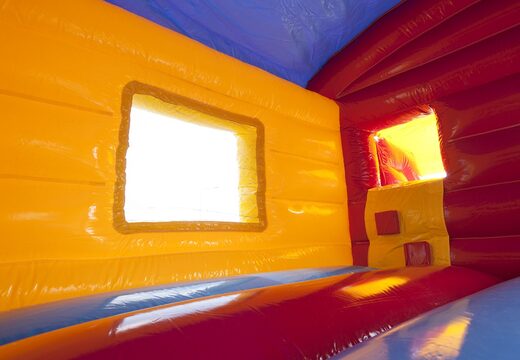 Klein overdekt opblaasbaar multiplay springkussen met glijbaan kopen in thema clown voor kinderen. Bestel springkussens online bij JB Inflatables Nederland