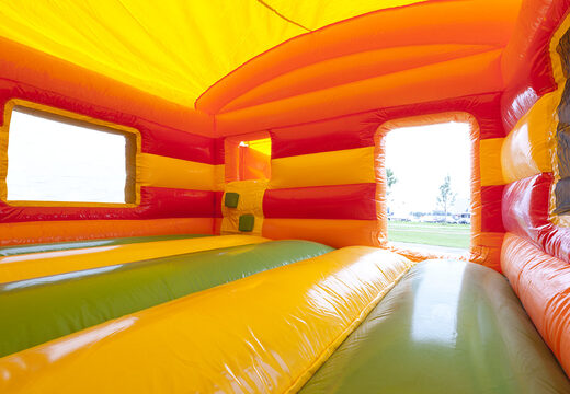 Koop maxi multiplay springkasteel in thema feest met een glijbaan voor kids bij JB Inflatables Nederland.  Bestel nu online springkastelen bij JB Inflatables Nederland