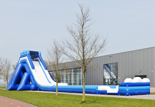 Monsterslide 11meter hoog en 53 meter lang met een dubbele trap en brede glijbaan kopen. Bestel opblaasbare glijbanen nu online bij JB Inflatables België