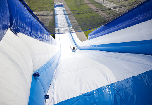 Bestel een perfecte opblaasbare monsterslide 11meter hoog en 53 meter lang met een dubbele trap voor kinderen. Koop opblaasbare glijbanen nu online bij JB Inflatables Nederland