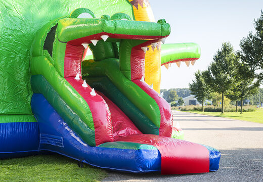 Opblaasbaar overdekt multifun super springkussen met glijbaan in de vorm van krokodil voor kinderen kopen. Bestel springkussens online bij JB Inflatables Nederland