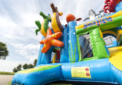 Multiplay springkasteel met slide in thema zee bestellen voor kinderen. Koop opblaasbare springkastelen online bij JB Inflatables Nederland