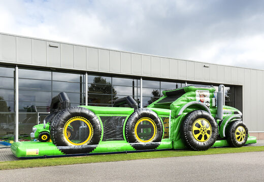 Unieke 17 meter brede stormbaan in traktor thema bestellen voor kinderen. Koop opblaasbare stormbanen nu online bij JB Inflatables Nederland