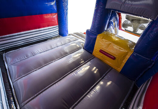 Klein overdekt opblaasbaar multiplay springkasteel met glijbaan kopen in thema formule 1 voor kinderen. Bestel opblaasbare springkastelen met glijbaan bij JB Inflatables Nederland