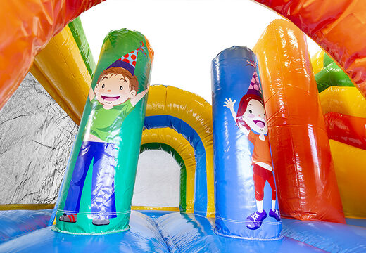 Koop middelmatig opblaasbare multiplay springkasteel in feest thema met glijbaan voor kinderen. Bestel opblaasbare springkastelen online bij JB Inflatables Nederland