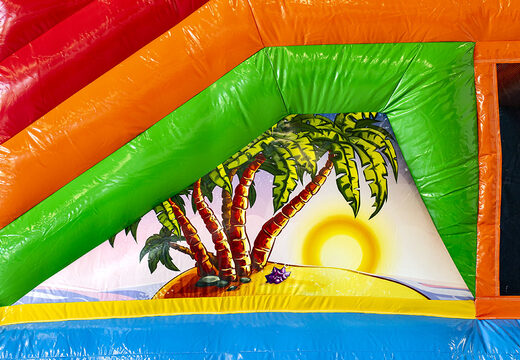 Springkasteel in hawaii theme met een glijbaan bestellen voor kinderen. Koop opblaasbare springkastelen online bij JB Inflatables Nederland