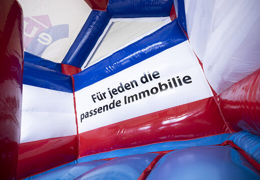 Promotionele op maat gemaakte EU Immobilien Multifun springkastelen kopen. Bestel nu opblaasbare reclame springkastelen in eigen huisstijl bij JB Inflatables Nederland