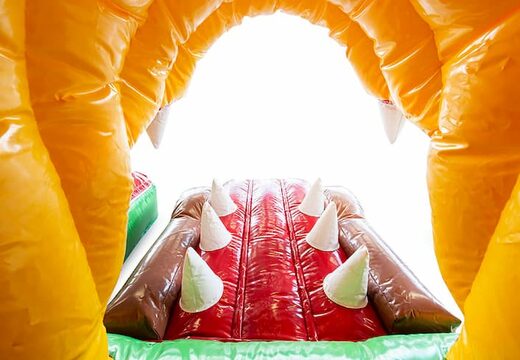 Springkasteel in thema Jungleworld met een glijbaan en 3D objecten kopen voor kinderen. Bestel springkastelen online bij JB Inflatables Nederland