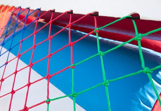 Springkussen in brandweer auto thema met glijbaan en leuke objecten op het springvlak bestellen voor kinderen.  Koop opblaasbare springkussens online bij JB Inflatables Nederland