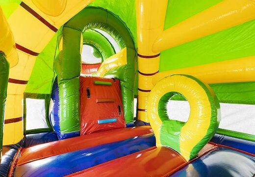 Groot opblaasbaar springkasteel met glijbaan in krokodillen thema bestellen voor kinderen