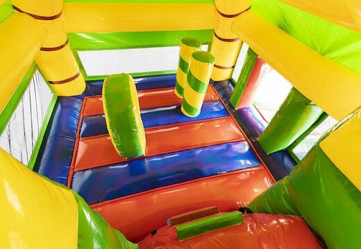 Groot opblaasbaar springkasteel met glijbaan in krokodillen thema kopen voor kinderen