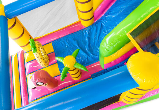 Opblaasbaar springkasteel met grote glijbaan bestellen in hawaii thema voor kinderen 