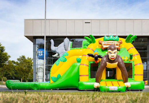 Multi super opblaasbaar springkasteel met glijbaan in Jungle thema groen geel bestellen voor kinderen